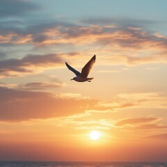 Fototapeta premium A majestic bird gliding through a colorful sunset sky, casting a serene presence over the ocean, Perfect for nature themes, travel articles, or inspirational quotes,