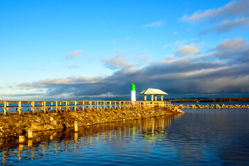 The Ottawa River in the first  light of the morning seen from the Pembroke Marina  in fall with a...