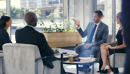 Meeting, talking or business people with investor in lobby for planning stakeholders capital...