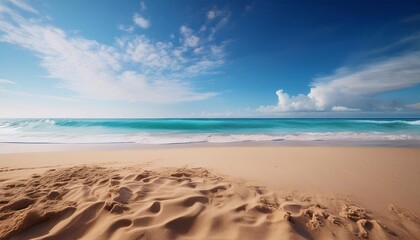 Fototapeta premium Tropical beach with coconut palm trees and turquoise water gently washing golden sand