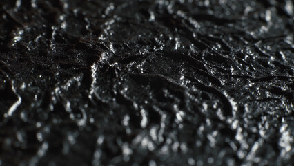 Ancient leather book. Rich texture of old, wrinkled leather. Macro shot. 