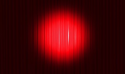 Closed maroon red curtain of stage with spotlight before show. Art performance background.