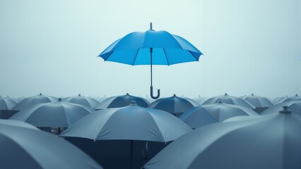 A sea of gray umbrellas with a single blue one standing out against a cloudy sky