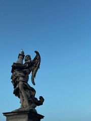 Statue with clear blue sky