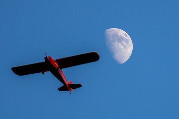 Airplane and moon, Homer, N.Y.