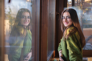 Portrait of young cheerful woman.