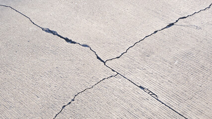 Obraz premium Broken crack lines texture on the old damaged concrete floor background