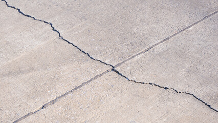 Fototapeta premium Broken crack lines texture on the old damaged concrete floor background