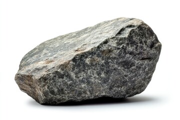 Fototapeta premium Single Gray Rock Isolated on White Background. Solid and Rough Texture, Representing Natural Pebble with Heavy and Cobbled Appearance