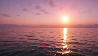 Obraz premium The sun rises over the Black Sea in Batumi with a soft pink glow on the water , , soft focus