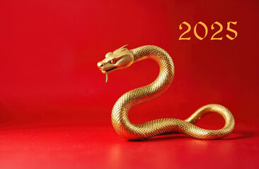 A golden snake curled up on a red background, the numbers 2025, the symbol of the Chinese New Year