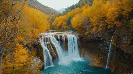 Autumn Waterfall Cascading Through Golden Trees