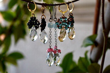 Beautiful earrings  hanging on the autumn branch