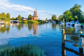 Obraz premium A classic dutch windmill in the city of Dokkum, Friesland, Netherlands