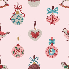 Seamless pattern of hand drawn vintage Christmas ornaments including baubles, heart, bird, scallop with bows on pink background. Vector design for wallpaper, textile, wrapping paper and greeting cards