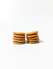 Stack of biscuit crackers. Four different shapes with sugar isolated on a white background