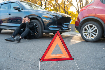 Car accident, traffic sign, desperate man