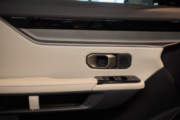 Fototapeta premium A car door with trim showcasing automotive design details