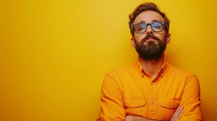 Obraz premium Bearded Man in Yellow Shirt