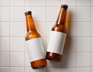 Bottles of cold beer on white tile background with mockup