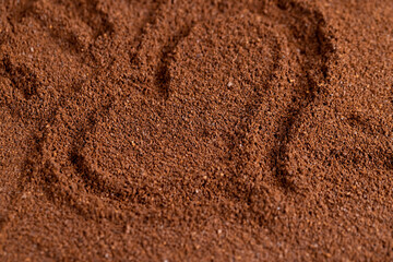 a large amount of ground coffee powder close-up