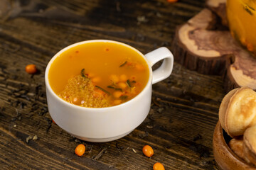 green hot tea with sea buckthorn and orange