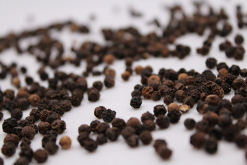 black pepper on white background