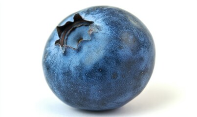 Obraz premium A close-up of a blueberry on a white surface, suitable for food, health, or lifestyle illustrations