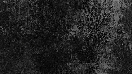 A black wall with a white paint. The wall is very plain and has no decorations. The wall is made of concrete. black texture background for template, page or web banner