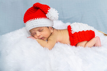 Newborn photography at home aby  boy Sleeps In Christmas Outfit 