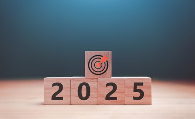Business planning and strategy to target concept. Wood block show target sign and 2025 for action...