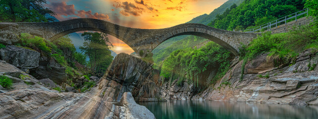 Panoramic Ancient double arch stone Roman bridge (Ponte dei Salti) over the clear water of the Verzasca river in Lavertezzo ,Verzasca Valley, Ticino Canton, Switzerland