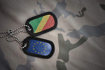 army blank, dog tag with national flag of republic of the congo and european union on the khaki...