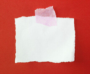 sheet of torn rip paper with masking tape