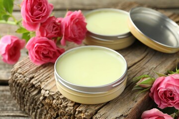 Natural solid perfume and pink roses on table, closeup