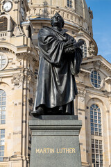 Monument to the famous Protestant Reformer Martin Luther in front of the Frauenkirche (Church of Our Lady) in Dresden, Germany