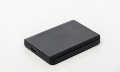Portable device resting on a clean white surface, ready for use in modern tech environments