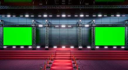 red carpet with golden barriers leading to a big green stage, emty stage