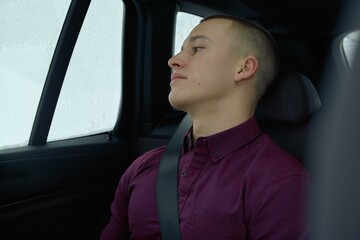 Quiet reflection during a snowy car ride in winter