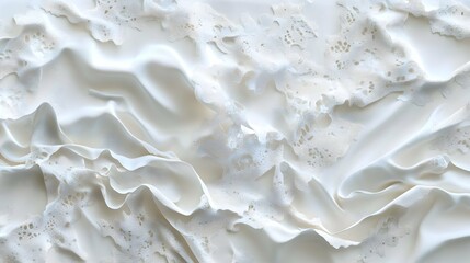 Abstract cream-colored fabric texture with lace overlay.
