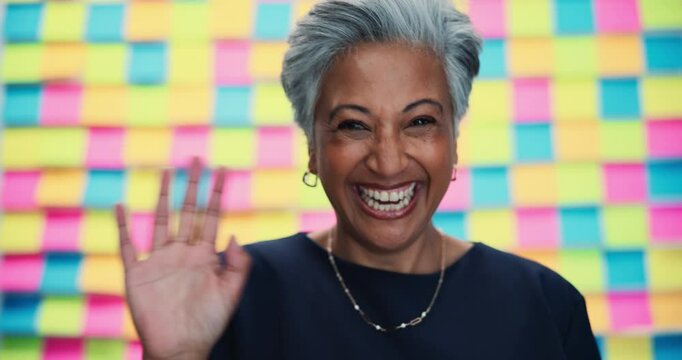 Face, business and woman with wave, sticky notes as background and virtual meeting, ideas or planning. Mature person, employee and happy or smile with greeting in confidence for startup company