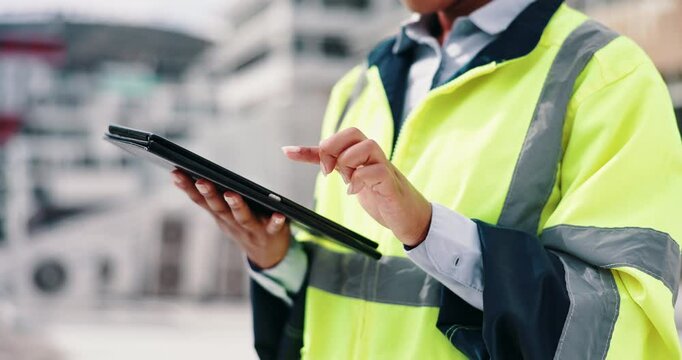 Engineer, hands and tablet outdoor on site for project management, quality control and online planning. Construction, worker and digital app for building design plan, inspection report and checklist