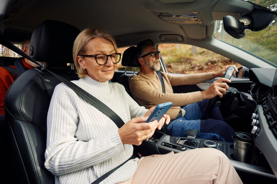 People are traveling by car