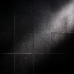 Fototapeta premium Sunlight or a lamp refracts and reflects onto a black wall with a texture that creates shadows dark background