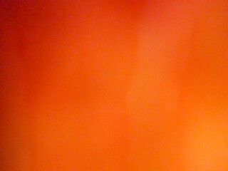 A vibrant, solid orange background with a subtle gradient effect. Ideal for presentations, web...