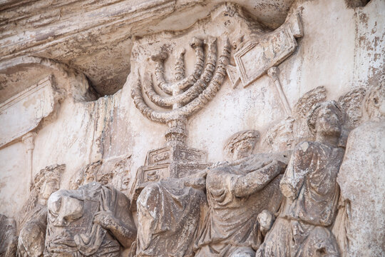 The Arch of Titus. Its panel depicts the spoils taken from the Temple in Jerusalem, as The Golden Menorah carved in deep relief, the unique Biblical Menorah model made by Moses. Roman Forum, 2017