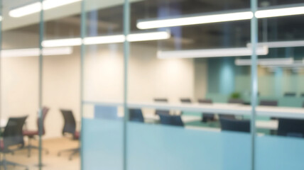 Fototapeta premium Blurred image of glass wall with office background. modern office 