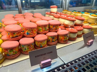 Sweet and delicious macaroons made of creams and meringues. Colorful fruit-flavored macaroons