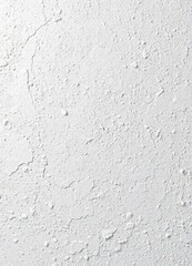 Rough-brushed plastered surface with a white coating, rough texture, aging process