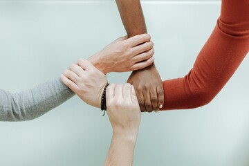 close up of hands holding hands together